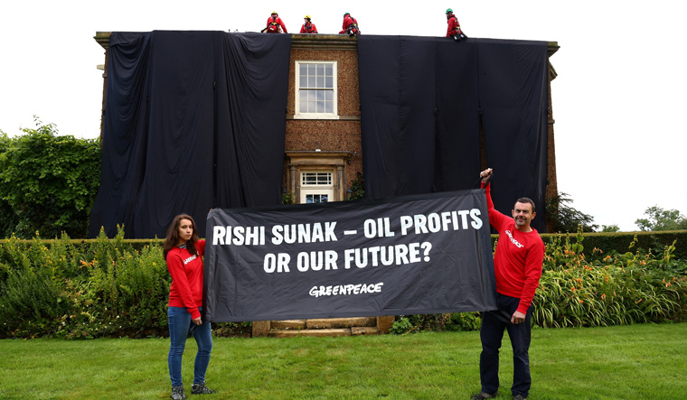 Greenpeace activists protest at Sunak residence